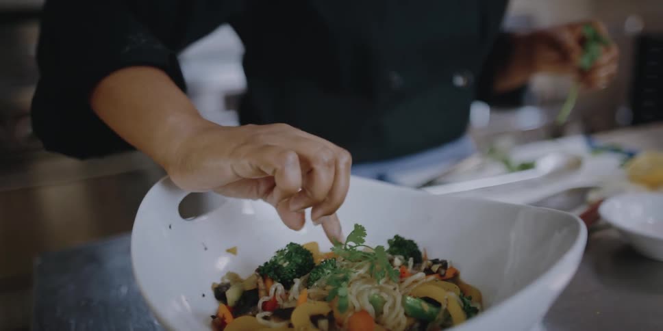 A woman cooking food