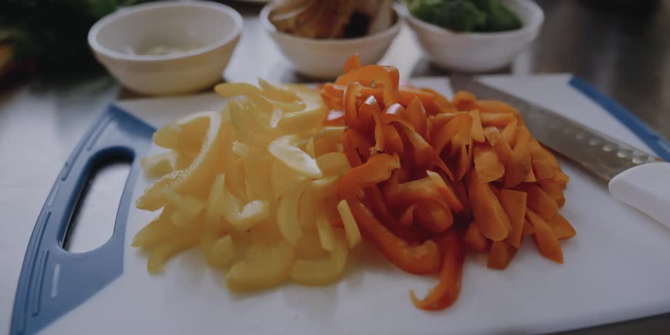 Sliced bell peppers on a cutting board
