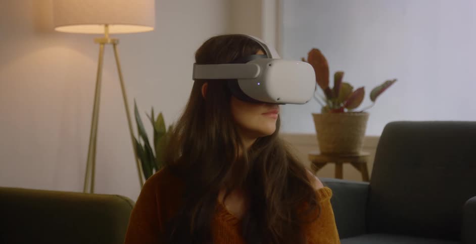 A woman wearing a vr headset