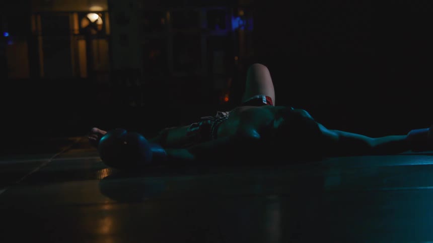 A person sleeping on a floor