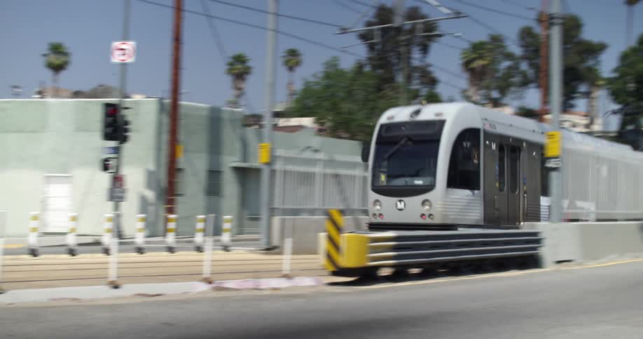 Commuter train moving in a city