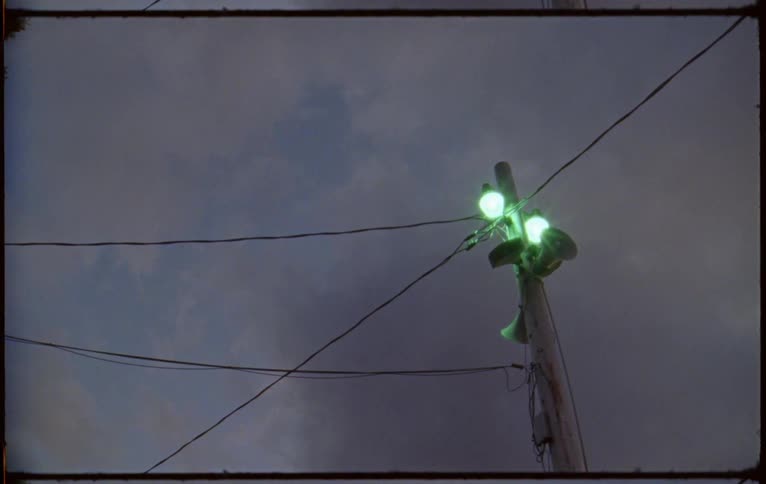 A view of lights on a power pole outside