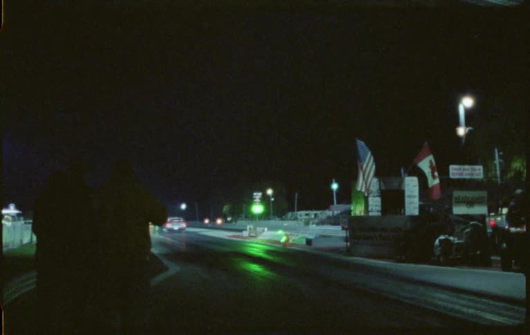 The car races off at the starting line
