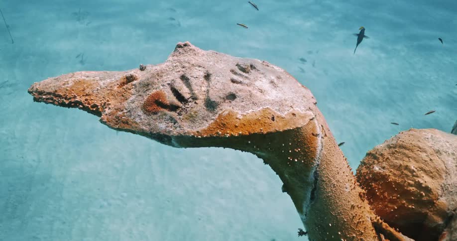 The hand of the Ocean Atlas underwater statue