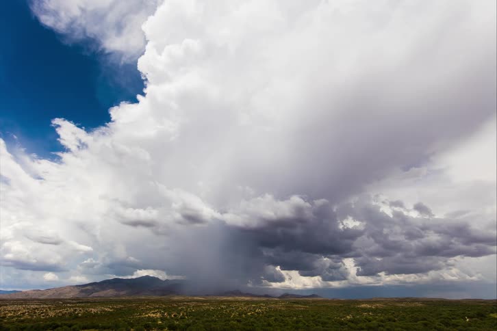 Time lapse of storm clouds moving across the land
