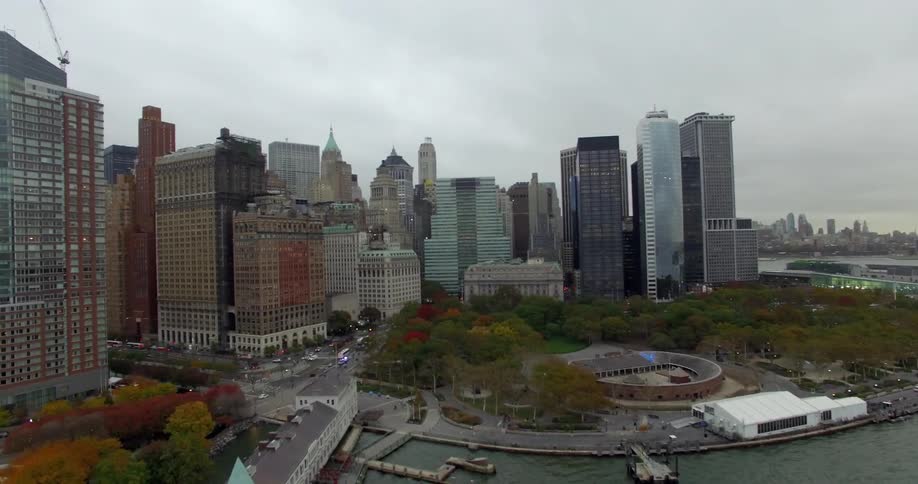 Aerial view of a large city next to some water