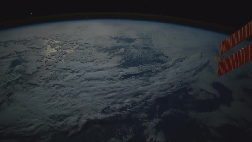 The planet earth with water clouds and atmosphere with space and stars in the background