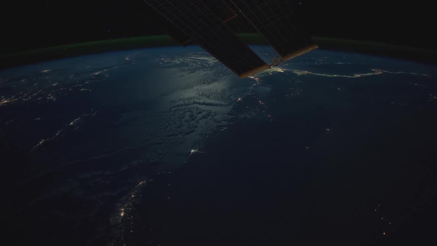 The planet earth with lights and atmosphere with space in the background