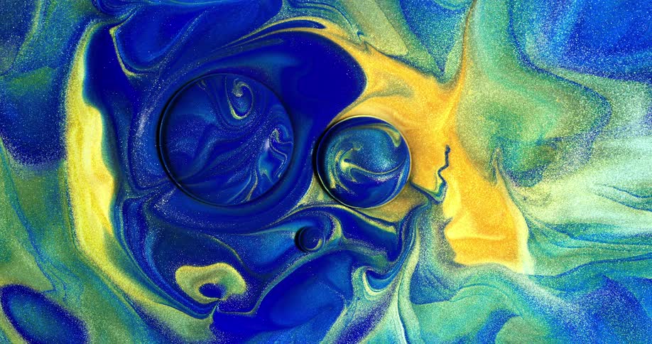 Colorful liquids swirl and bubbles try to merge