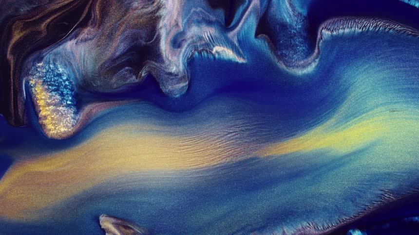 Multi colored ink flows like a river