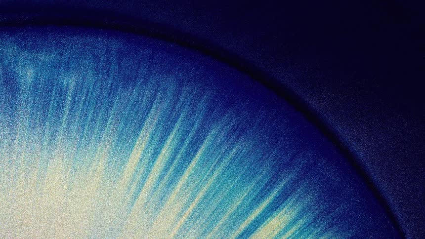 A blue bubble expanding into the dark blue darkness