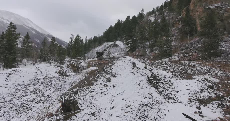 A snow covered mountain landscape on a winter day