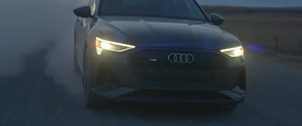 A car is racing down the road