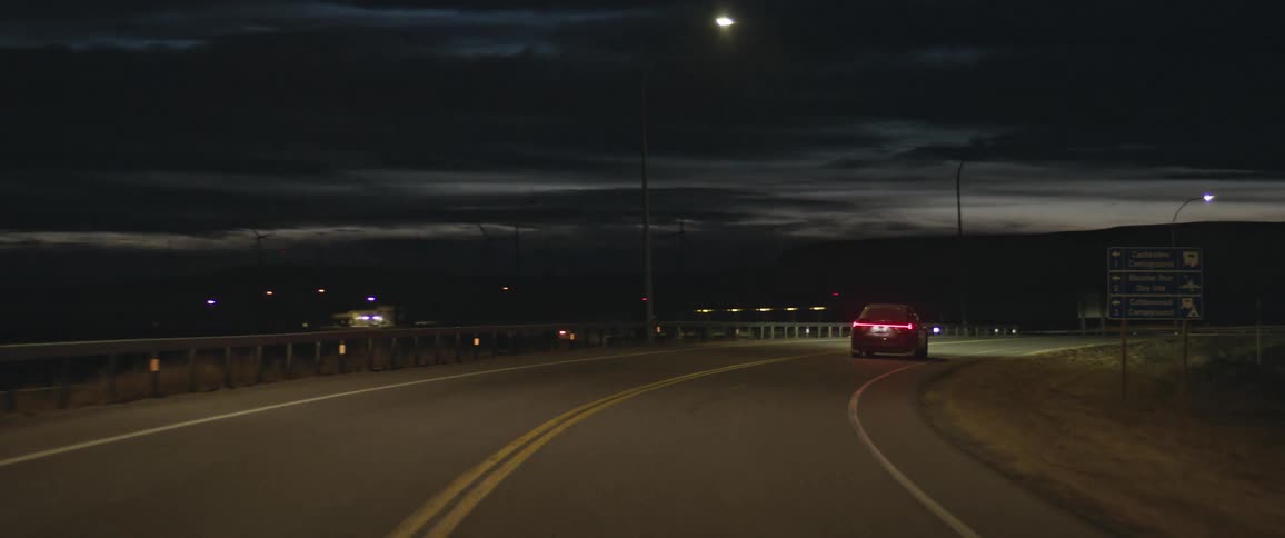 A car driving down a road