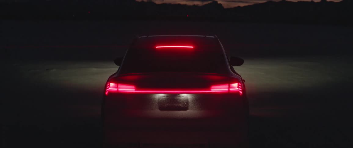 A view of a car at night outdoors