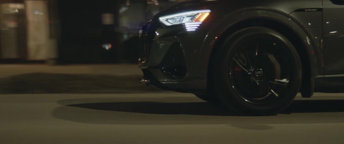 A car driving down a city street