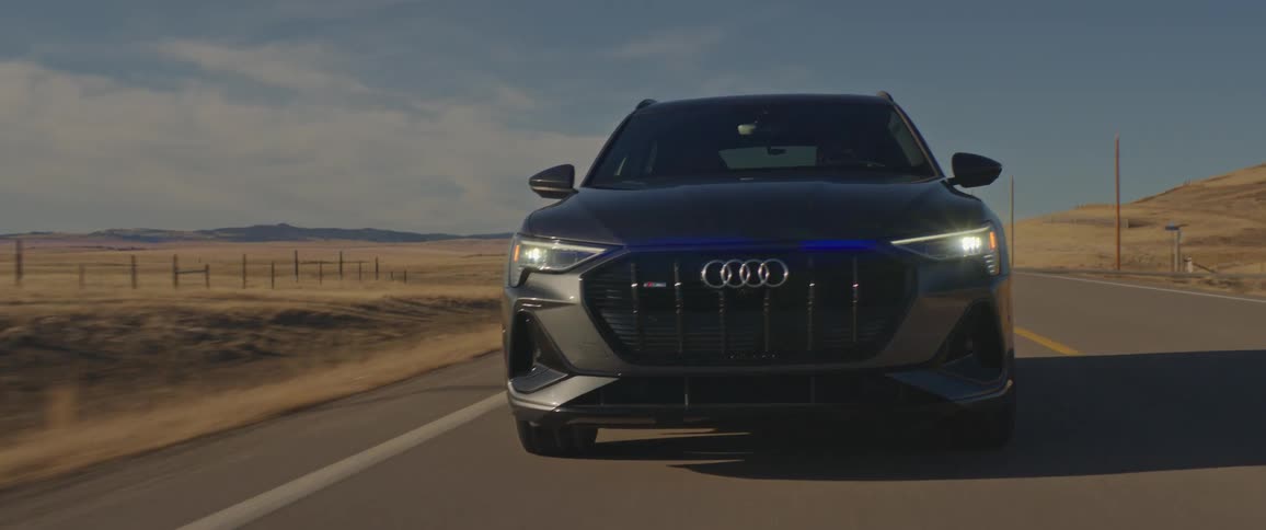 A car is driving on the highway