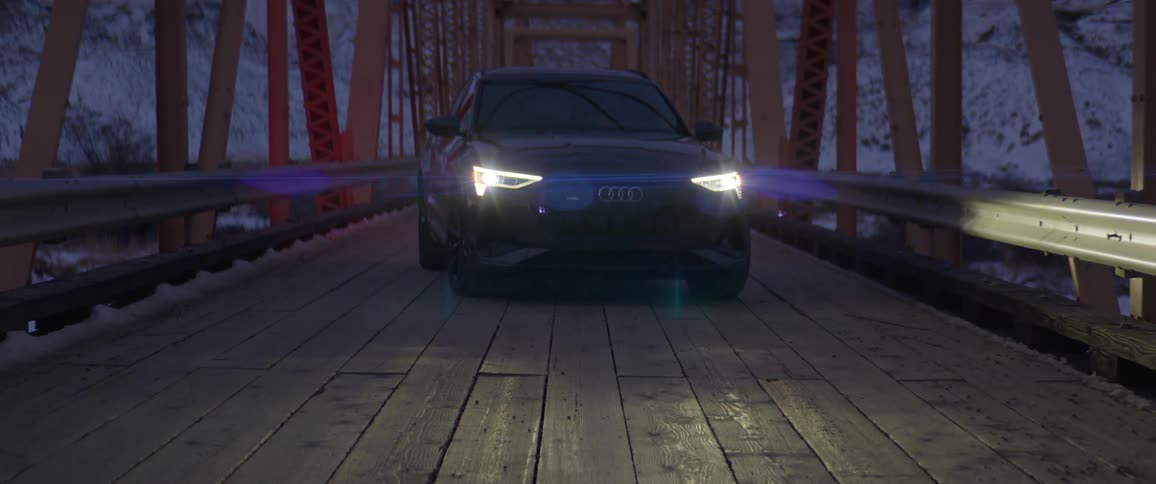 A car is parked on the small bridge