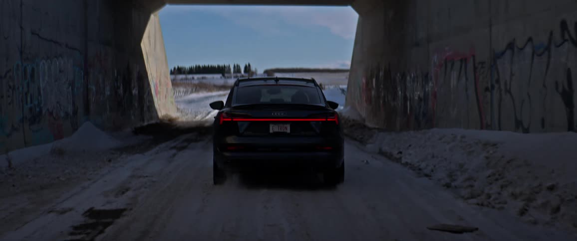 A view of a car that is driving through a tunnel