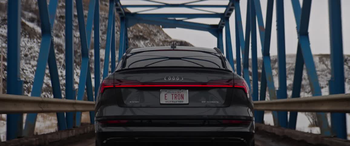 A car crosses a small bridge