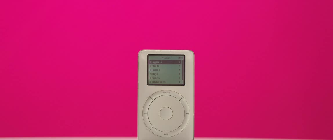 A view of an ipod sitting on a table in a room