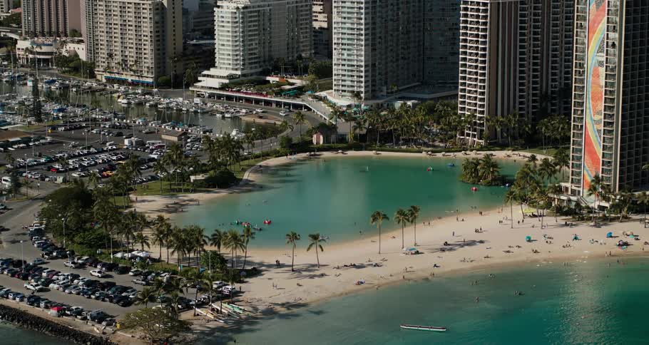 Tall skyscrapers on a coastal city in the tropics near the beach