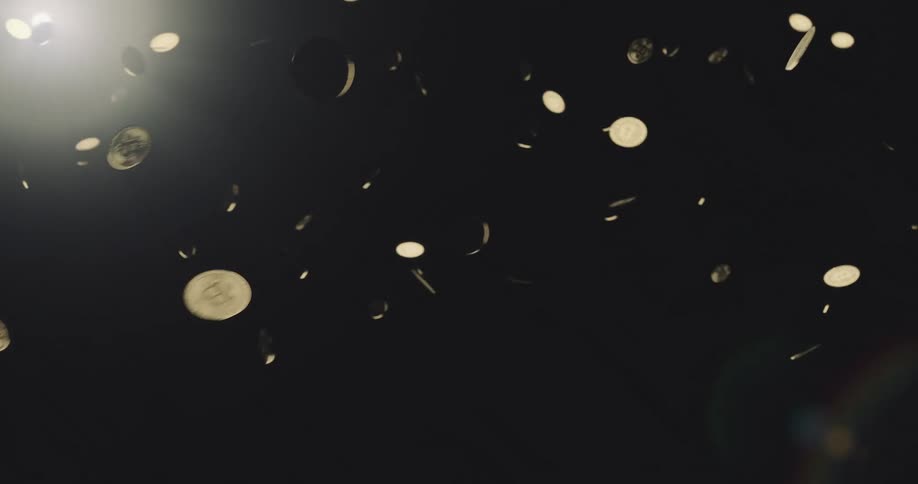 Bitcoin falling on a dark background