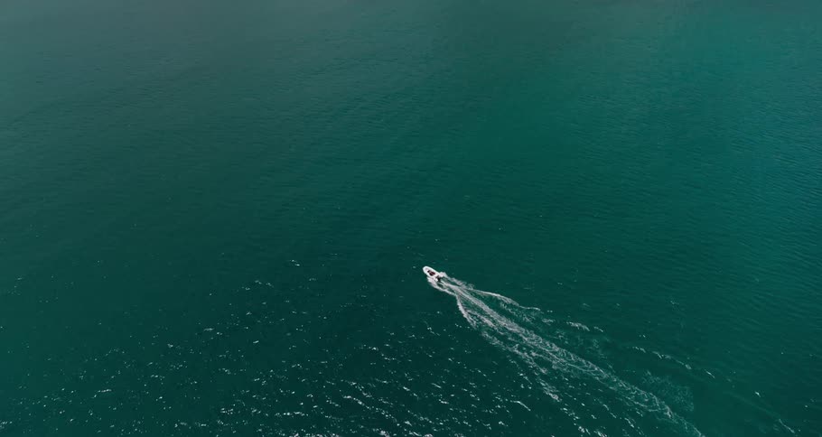 An aerial view of a boat on the water