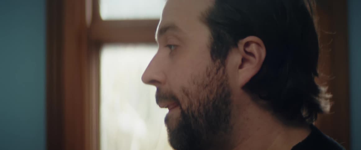 A man is talking in the room