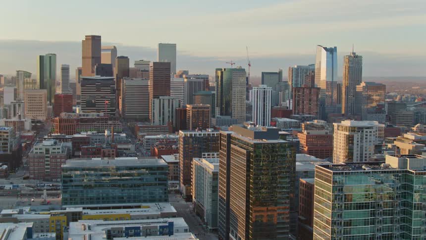 Aerial view of a downtown city is displayed at dusk