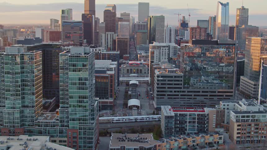 Aerial shot of a metropolitan city with skyscrapers in sight