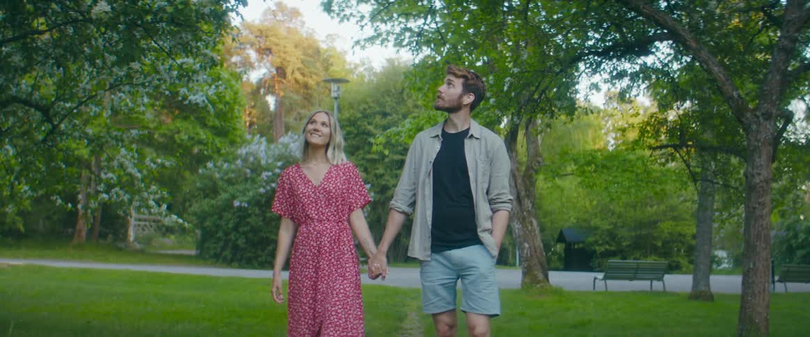 A couple holding hands together