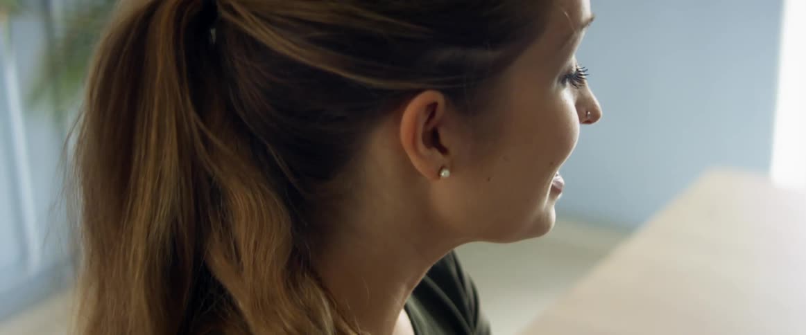 A woman sitting and talking