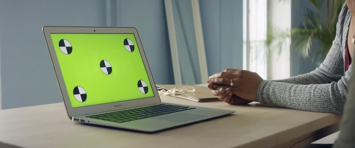 Two women looking at a computer