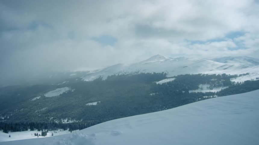 Footage of a snowy mountain range