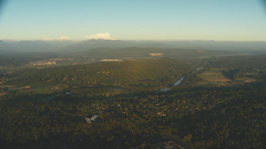 Aerial view of a small town in the banks of a river in the plains
