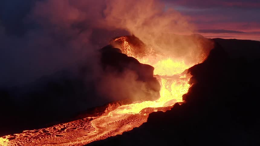 Lava flows as a volcano erupts