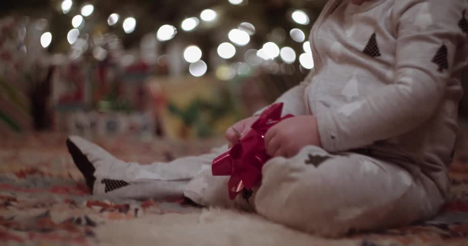 A child is playing with a bow