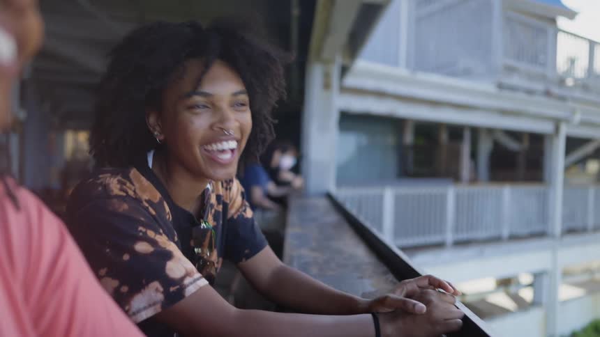 Two women laughing together