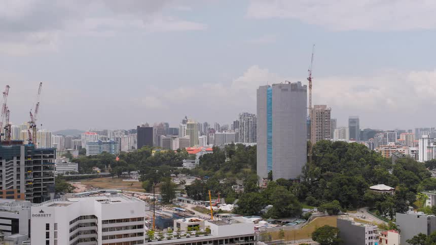 Time lapse of buildings being constructed in a city