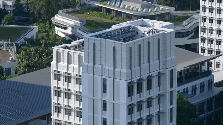 A time lapse shows a skyscraper being constructed in an urban area