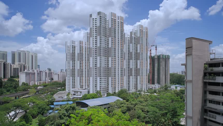 A large city building is constructed next to another city building