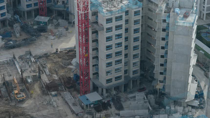 Construction workers building a high rise