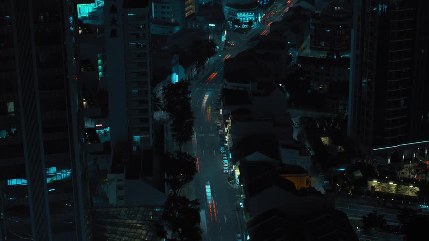Time lapse of a neighborhood with multiple cars driving on the road