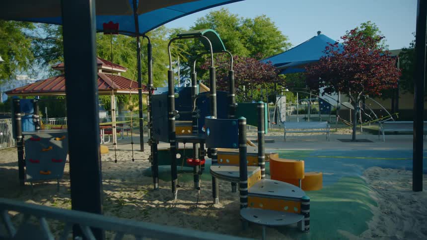 An empty playground is displayed in spring