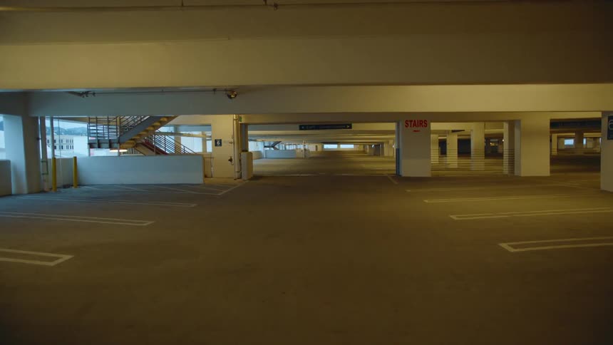 An empty parking garage at dusk