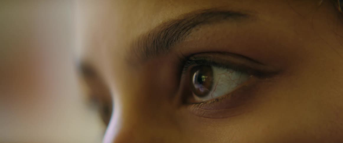 Close up of a womans eyes blinking