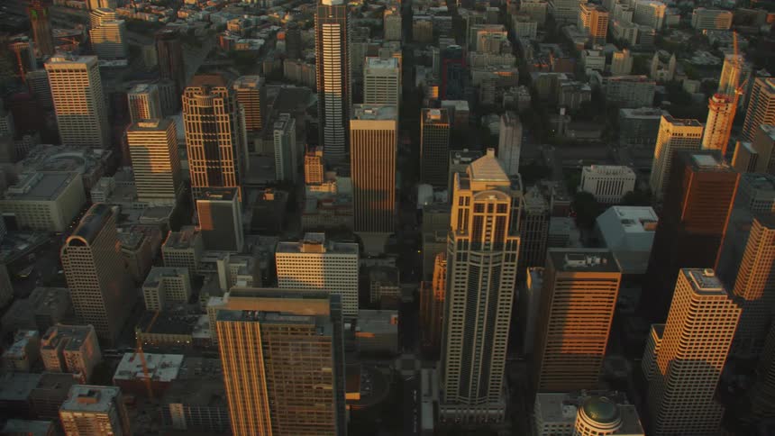 Skyscrapers share streets with lower rise buildings in city downtown