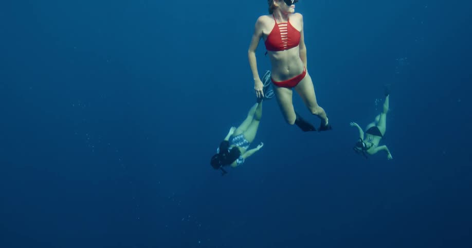 Group swimming underwater