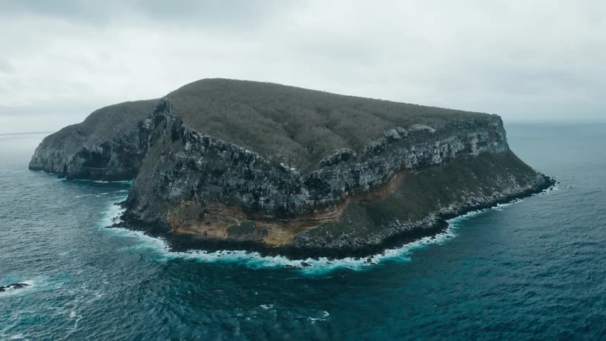 Grey island surrounded by ocean